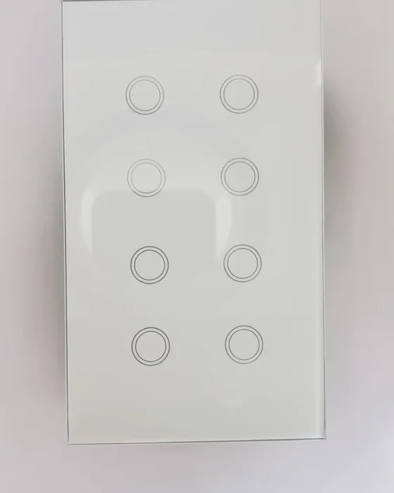 Multi-gang glass smart switch photographed in our office